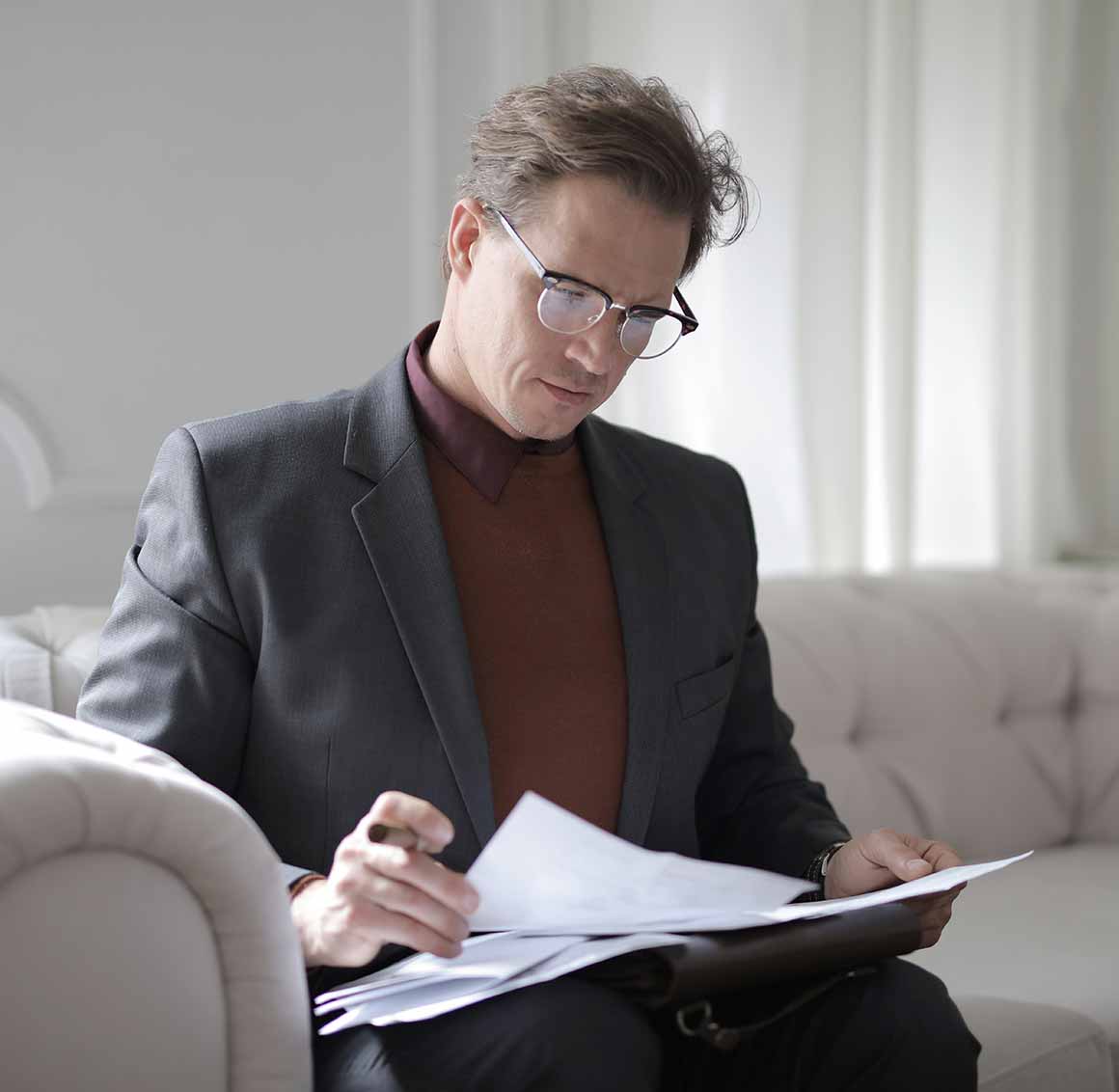 Man Going through Papers